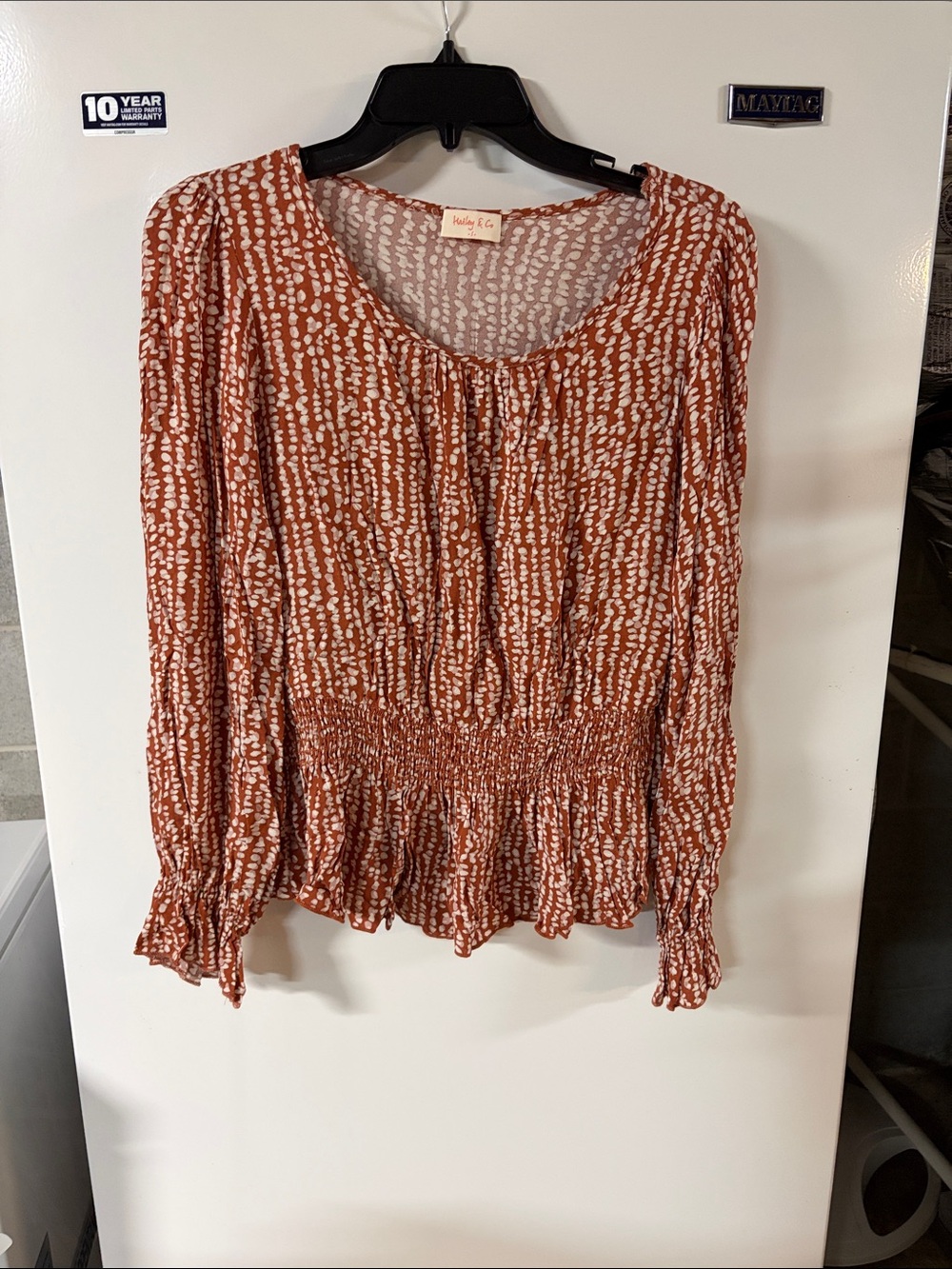 Hailey & Co peplum top.